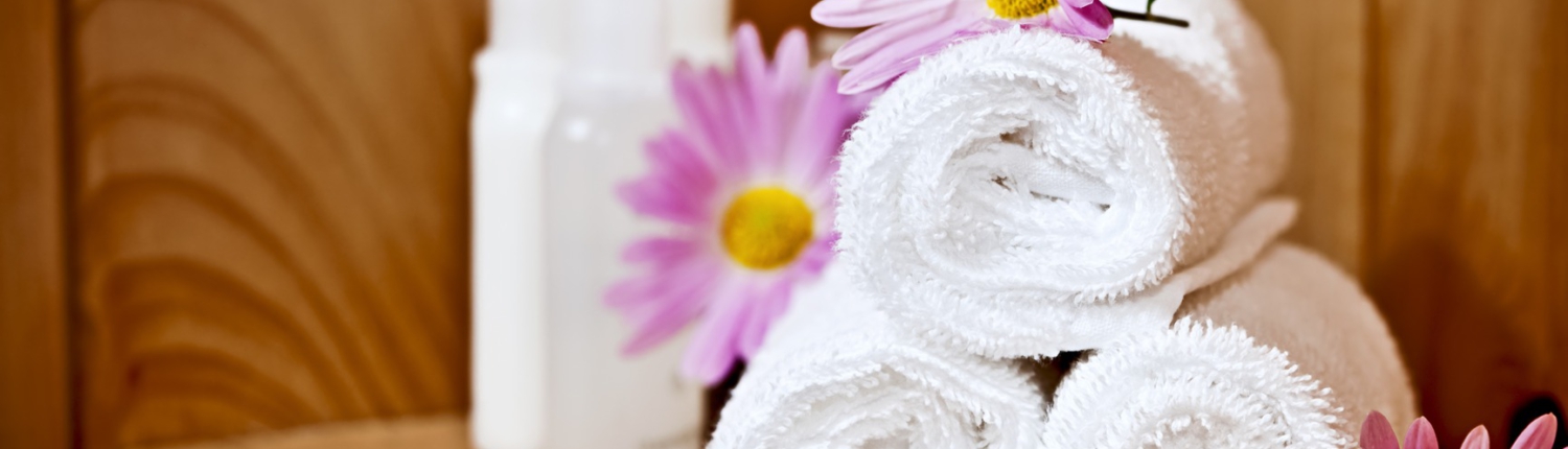 White rolled up spa towels