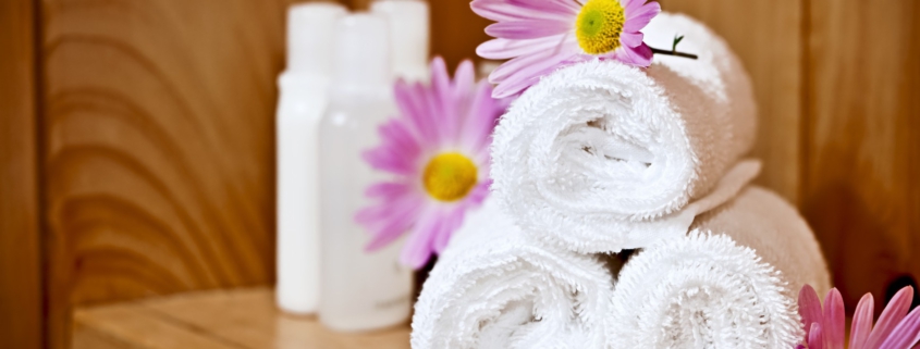 White rolled up spa towels
